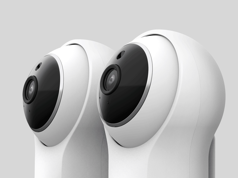 Curved camera housing shown at multiple viewing angles